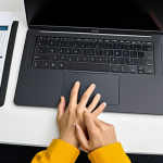 **

"A professional travel blogger, fully clothed in modest travel attire, researching visa requirements for Guinea at a modern desk with a laptop, bright and clean office setting, appropriate content, safe for work, perfect anatomy, correct proportions, well-formed hands, proper finger count, professional photography, high quality."

**